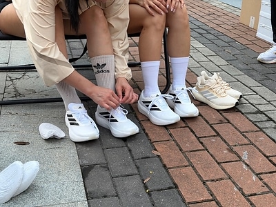 Runners trying on the new ZENBOOST shoes at the event in Kuala Lumpur. Runners trying on the new ZENBOOST shoes at the event in Kuala Lumpur.